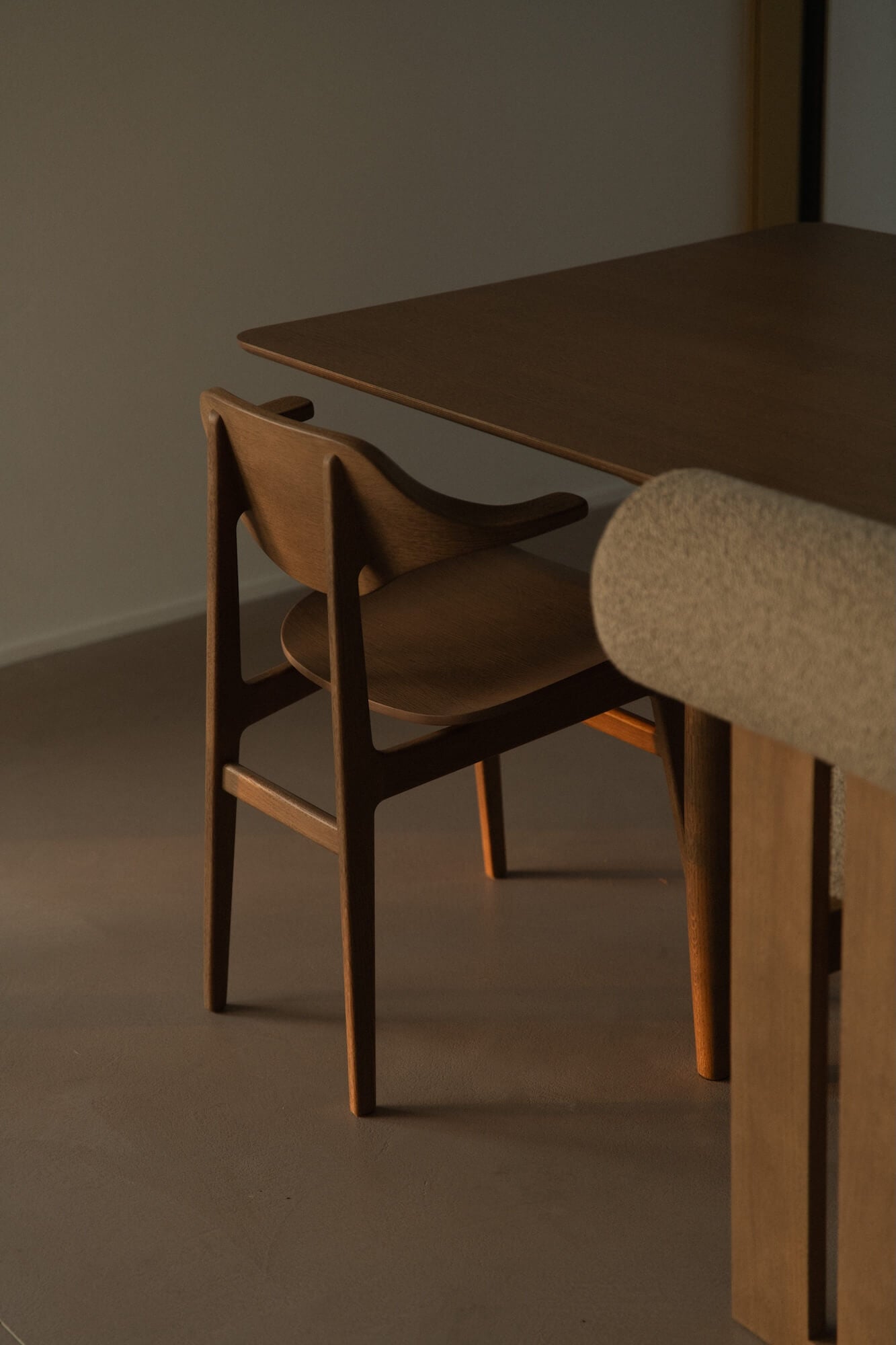 Dining table with chairs in a minimalistic setting