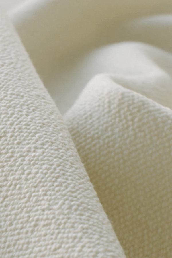 Close-up of textured beige Vidar fabric